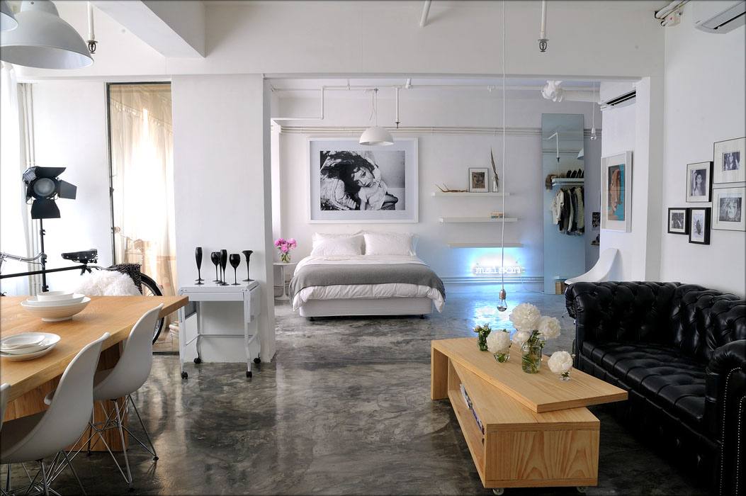 Modern open plan apartment with sitting dining and sleeping areas